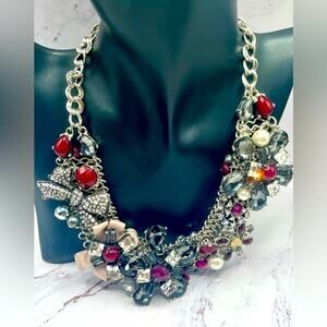 White House Black Market purple flower glass necklace, bows and rhinestones